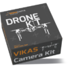 A black box labelled "DRONE KIT" with an image of a drone, featuring the brand "Dronacharya Tech Hub" and the text "VIKAS Camera Kit”